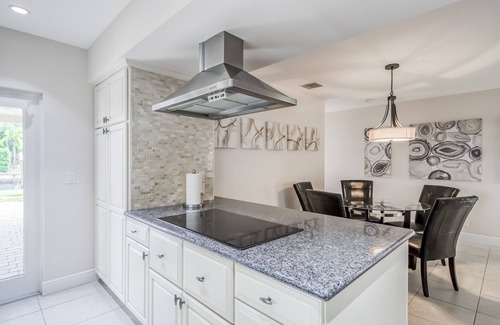 Singer Island House | Contemporary Canal-Front Home with Private Pool & Spa, Free WiFi & Private W/D