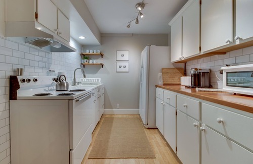 Uptown Apartment | Contemporary home complete w/ patio, WiFi, & full kitchen