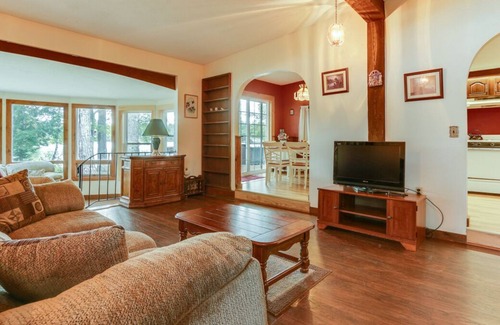 Lochmere House | Contemporary pet-friendly waterfront home on Silver Lake with lovely sunroom