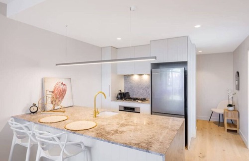 Milton Apartment | Conveniently located 2BR apt w/rooftop pool @Milt