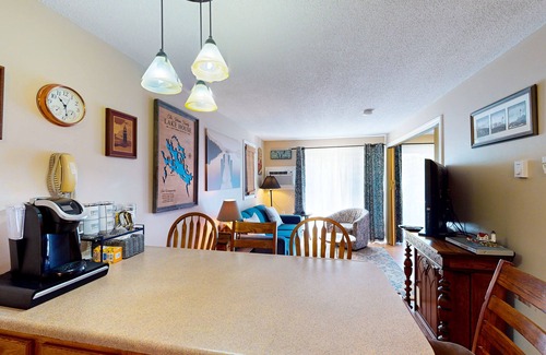 Gilford Condo | Conveniently located condo w/a balcony, access to sports courts & private beach