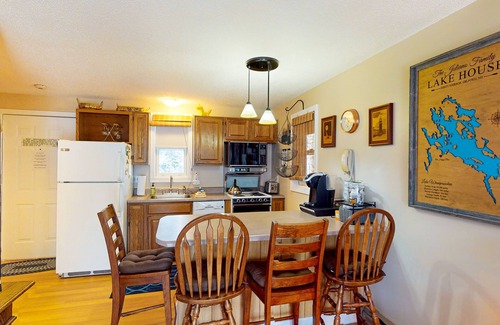 Gilford Condo | Conveniently located condo w/a balcony, access to sports courts & private beach