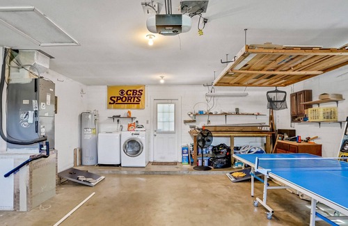 Bay Crest Park House | Conveniently located home with pool, Ping-Pong, screened patio, grills, & W/D
