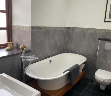 Amlwch House | Converted chapel - Sant Pedr Newydd - with sea views