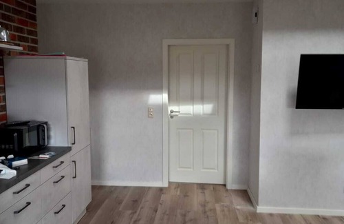 Dornum Condo | Core-serviced apartment directly on the small dike for up to 4 people