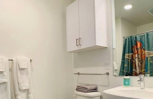 Roosevelt Condo | Corner unit studio with natural light and premium amenities for a very comfortable quick stay.
