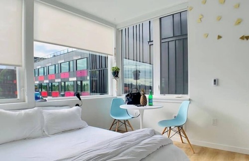 Roosevelt Apartment | Corner unit studio with natural light and premium amenities for a very comfortable quick stay.