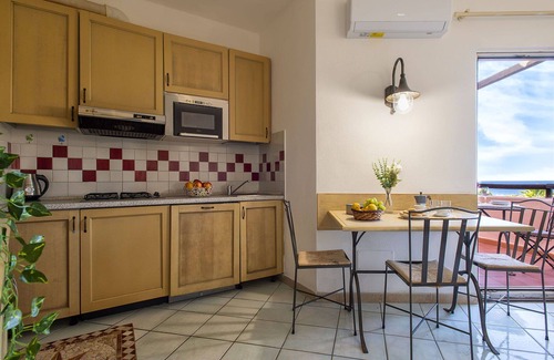 Canneddi Apartment | Cosy apartment for 4 people with A/C, WIFI, pool, TV, terrace and pets allowed