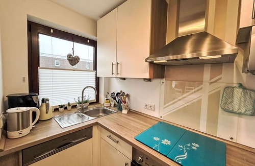Westeraccumersiel Apartment | Cosy apartment for 2 guests with WIFI, TV, balcony, pets allowed and parking