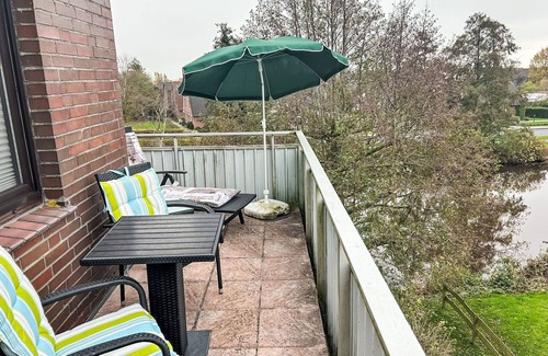 Westeraccumersiel Apartment | Cosy apartment for 2 guests with WIFI, TV, balcony, pets allowed and parking