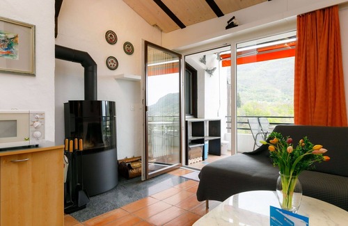 Capriasca Apartment | Cosy apartment for 4 people with pool, WIFI, TV, patio and panoramic view
