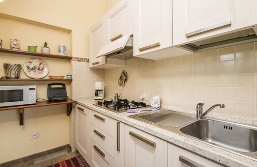 Fornole Apartment | Cosy apartment for 4 people with A/C, pool, WIFI, TV and veranda