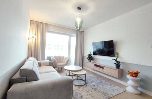 Kolobrzeg Apartment | Cosy apartment for 4 guests with pool, WIFI, TV, balcony, pets allowed and parking