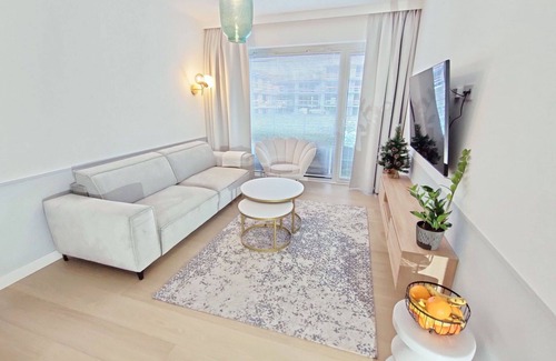 Kolobrzeg Apartment | Cosy apartment for 4 guests with pool, WIFI, TV, balcony, pets allowed and parking
