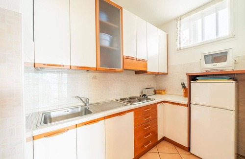 Germignaga Apartment | Cosy apartment for 4 guests with WIFI, pool, TV and terrace