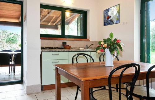 Guardistallo House | Cosy apartment in villa for 4 guests with pool, terrace and pets allowed