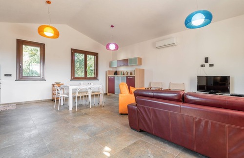Chia House | Cosy Holiday Apartment "Villa Fico 2" with Balcony, Garden and Air Conditioning