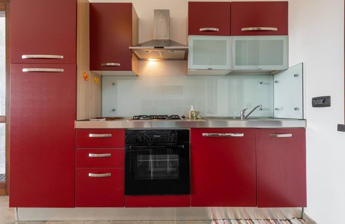 Chia House | Cosy Holiday Apartment "Villa Fico 2" with Balcony, Garden and Air Conditioning