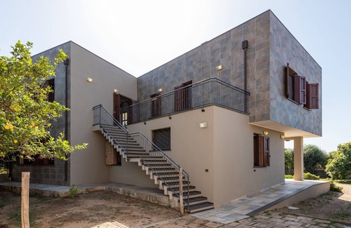 Chia House | Cosy Holiday Apartment "Villa Fico 2" with Balcony, Garden and Air Conditioning