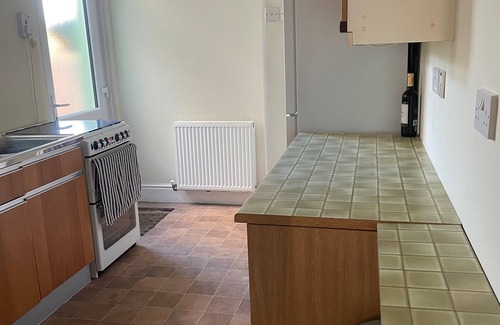 Beckermet House | Cosy village house walking distance to beach and 2 pubs.