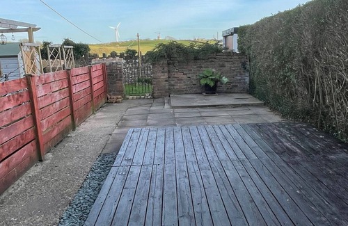 Beckermet House | Cosy village house walking distance to beach and 2 pubs.