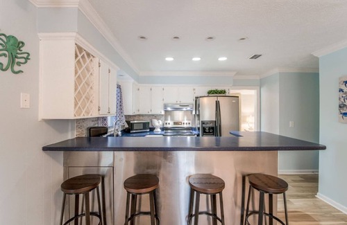 Jacksonville Beach House | Cottage Home with Heated Pool and Screened in Porch.