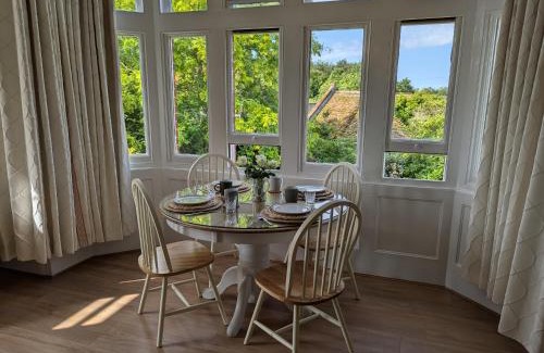 Binham Apartment | Country house holiday with a tennis court!