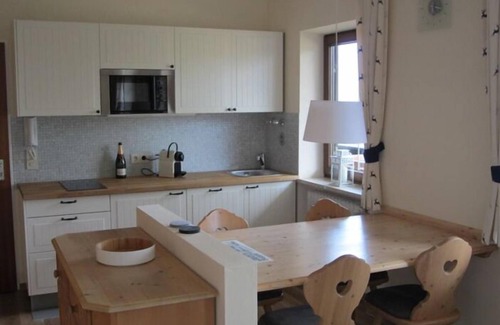 Oberaudorf Apartment | Country house still with large corner balcony and the view of the mountains ,box spring beds,dishwasher,microwave,sauna,