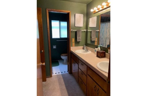 Coupeville House | Covered, heated deck for perfect winter experience