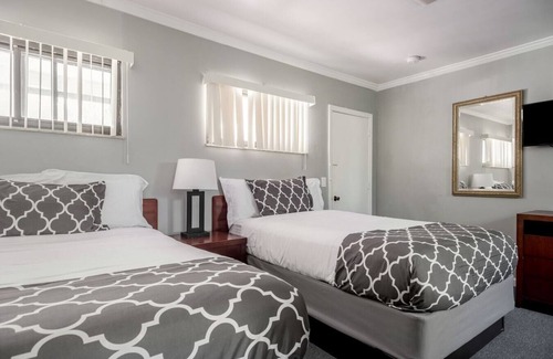 Riverview Hotel | Cozy Browntown Room for 4: Wi-Fi and Free Parking