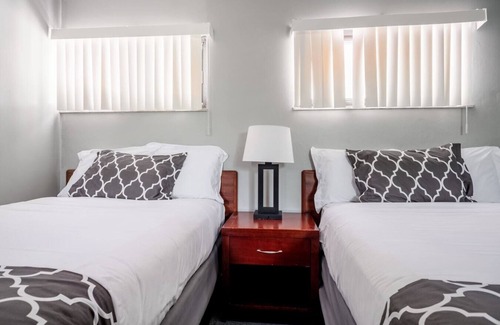 Riverview Hotel | Cozy Browntown Room for 4: Wi-Fi and Free Parking