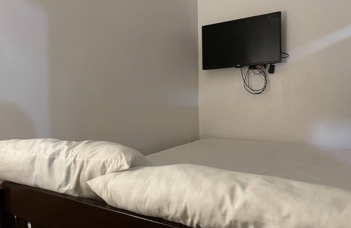 Zamboanguita Apartment | Cozy 1-bedroom apartment with WiFi, AC in tranquil Dauin