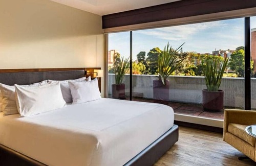 La Gran Via Hotel | Cozy 1-bedroom in charming Bogotá with personnel cook and massager