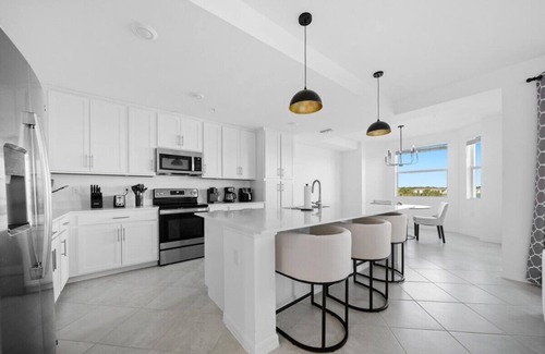 Biggar Condo | Cozy 2-bedroom condo with WiFi, fitness room in charming Babcock Ranch Florida.