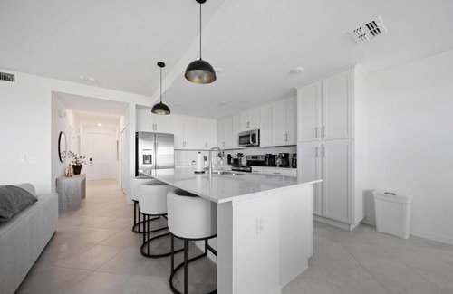 Biggar Condo | Cozy 2-bedroom condo with WiFi, fitness room in charming Babcock Ranch Florida.