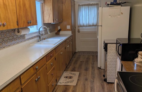 Laramie House | Cozy 2-bedroom house in Laramie with park-like yard and close to everything!