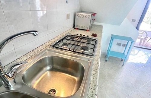 San Teodoro House | Cozy 2-bedroom townhome in beautiful Lu Lioni with WiFi