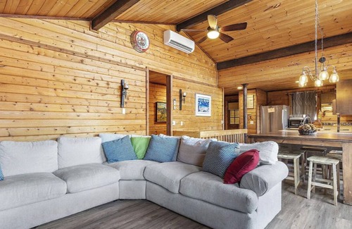 Worley Cabin | Cozy 3-bedroom cabin in fabulous Worley with AC, WiFi, and a game room.