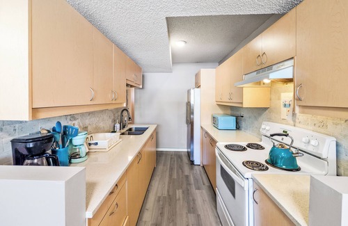 Sunnyside House | Cozy 3BR Basement Suite with Wi-Fi by Bow River