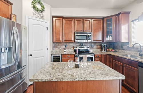 Colorado Springs House | Cozy 6BR Colorado Springs Retreat w/Hot Tub, Gym, Theater & Sunset Views!