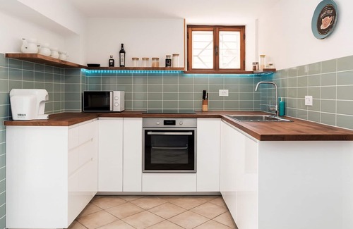 La Pietraia Apartment | Cozy Alghero Getaway - walk to the beach & relax on the patio