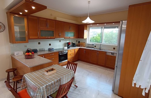 Lavreotiki Apartment | Cozy and luxury by the sea with spectacular view. Family sized with bbq and yard