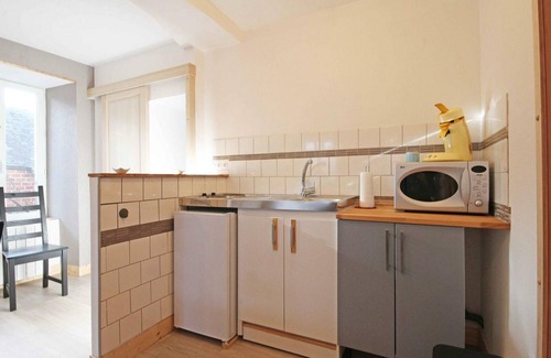 Segrie-Fontaine Apartment | Cozy Apartment Above Café Bookstore with Garden and Electric Bike Rentals
