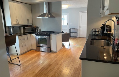 Holy Cross House | Cozy bright 2BR downtown duplex, garage, fenced