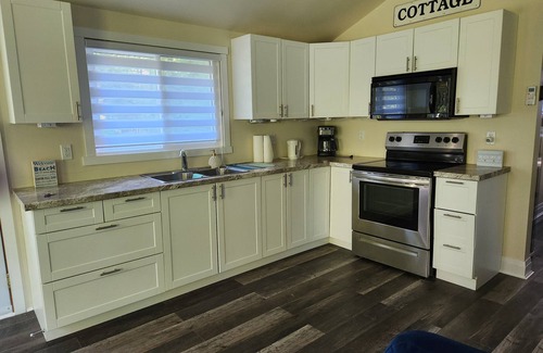 Killaloe Cottage | COZY CABIN IN THE WOODS FOR 2. SPACIOUS WELL APPOINTED. NEW LISTING!