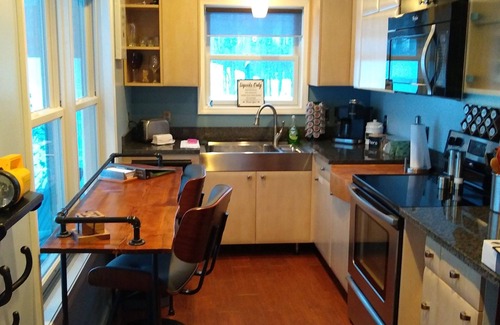 Boyne Falls Cabin | Cozy cabin-WIFI & outdoor hot tub, Close to Boyne Mt & great for snowmobiling