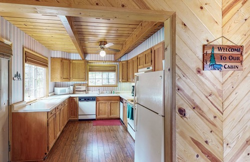Arnold House | Cozy cabin with large deck, grill, fast WiFi, central AC, & wood-burning stove