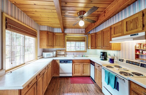 Arnold House | Cozy cabin with large deck, grill, fast WiFi, central AC, & wood-burning stove