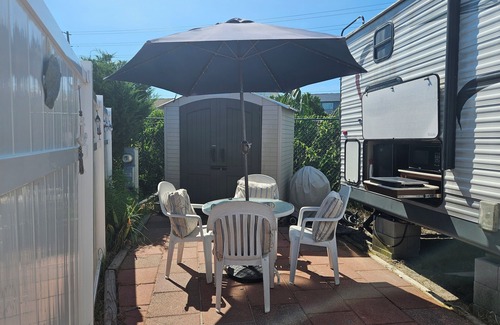 North Topsail Beach House | Cozy camper with outside kitchen & grill, pool and walking distance to the beach