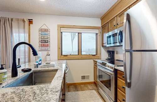 Bellaire Condo | Cozy Condo in Shanty Creek Resort, near Skiing, Snowmobiling, Golf, Lakes & More